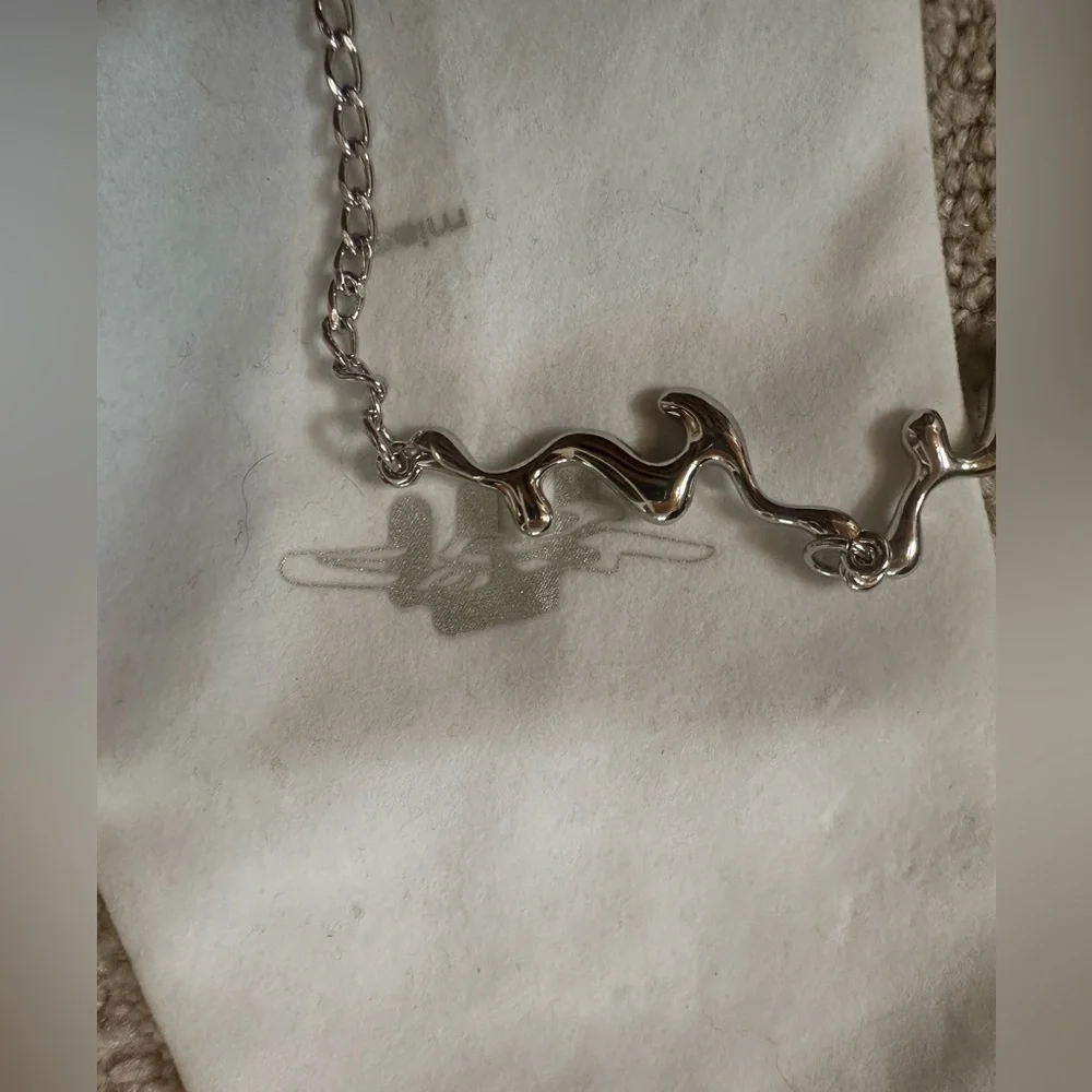 Miaou arm cuff